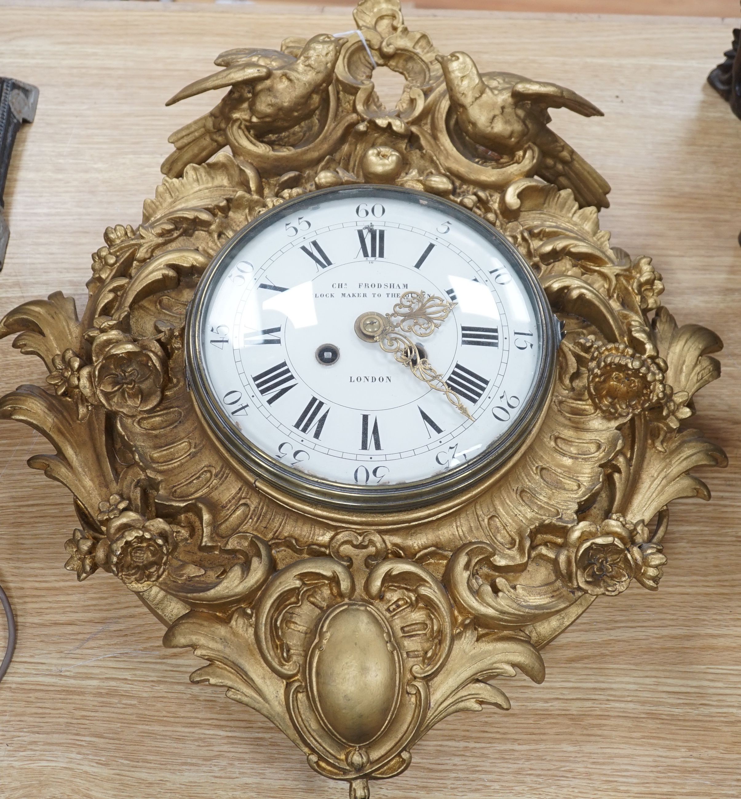 A late 19th century French giltwood and composition wall clock, retailed by Charles Frodsham, 53 cm high